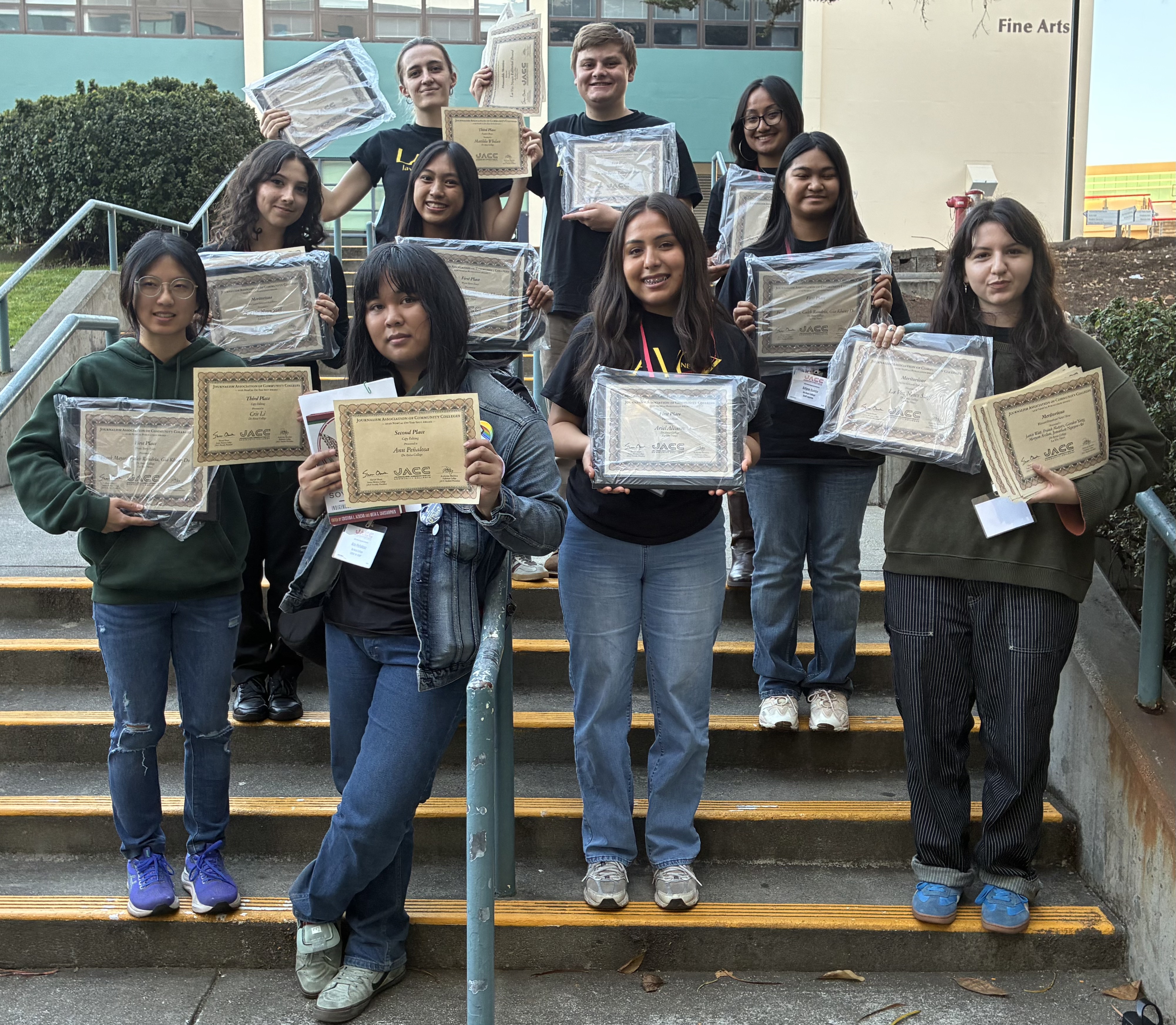 La Voz journalists pose with their awards