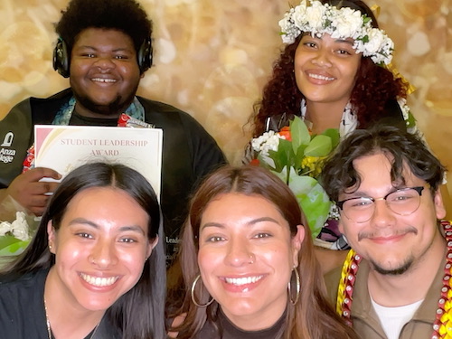 students holding certificate